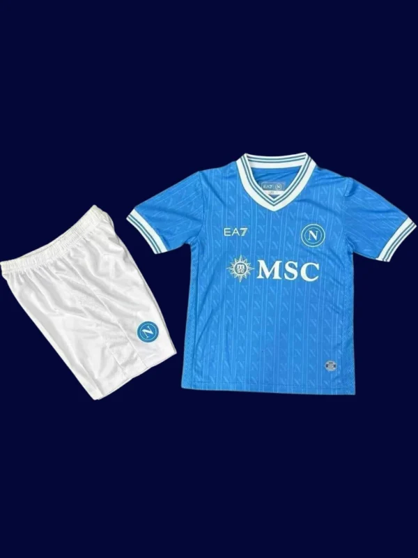 Napoli Home Kids Kits 25/26 front with mini crest and youth-friendly fit.