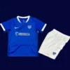 Portsmouth Home Kids Kits 25/26 front with mini crest and youth-friendly fit.