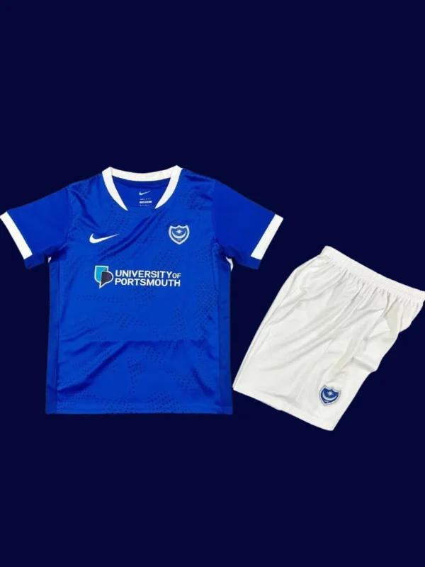 Portsmouth Home Kids Kits 25/26 front with mini crest and youth-friendly fit.
