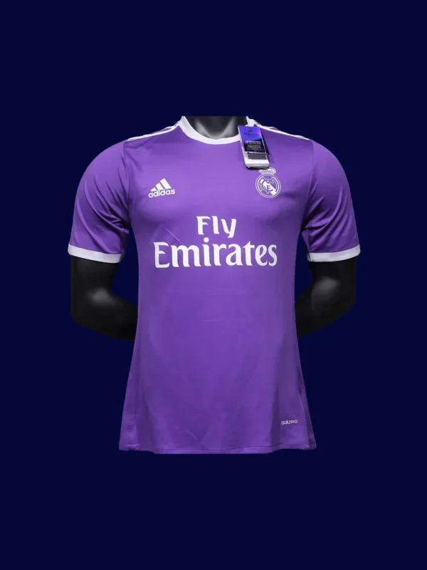 front view of purple away retro football jersey (16/17) with player cut and V-neck detail.
