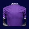 back view of purple away retro football jersey (16/17) showing reinforced number area and slim taper.