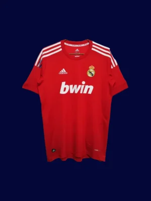 front view of red away retro football jersey (11/12) with contrast trims and classic sponsor-free look.