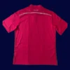 back view of red away retro football jersey (14/15) showing reinforced back panel and number area.