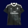 front view of black dragon themed retro football jersey (14/15) with embossed pattern.
