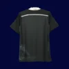 back view of black dragon retro football jersey (14/15) showing patterned back and number-ready panel.