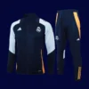 front view of black tracksuit top with modern cuts and logo panel (24/25).