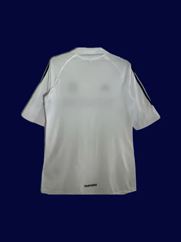 back view of white home retro football jersey (05/06) showing tidy back panel and number-ready surface.
