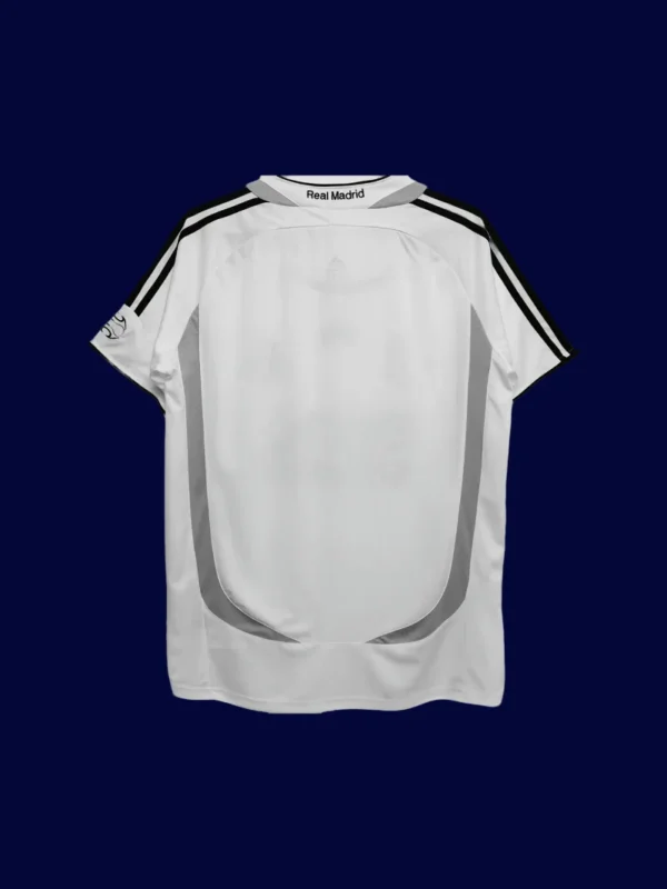 back view of white home retro football jersey (06/07) showing reinforced back and tapered hem.