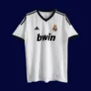 front view of white home retro football jersey (12/13) with traditional collar and subtle piping.