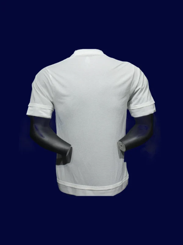 back view of white home player-fit retro jersey (15/16) showing tapered back and reinforced number zone.