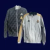 front view of reversible windbreaker showing one side patterned and one side plain (24/25).