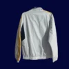 back view of reversible windbreaker displaying reverse print and hood detail (24/25).