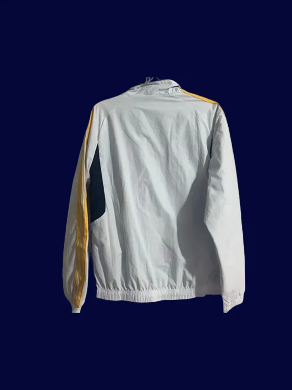 back view of reversible windbreaker displaying reverse print and hood detail (24/25).