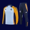 front view of modern tracksuit top with tapered fit and full zip (2025).