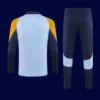 back view of tracksuit top showing clean back panel and ergonomic seams (2025).
