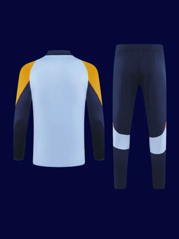 back view of tracksuit top showing clean back panel and ergonomic seams (2025).