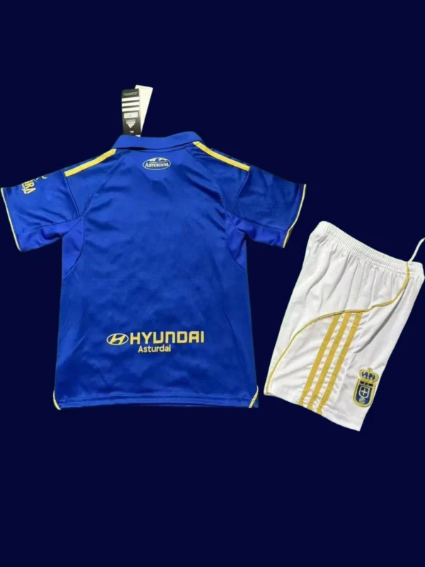 Real Oviedo Home Kids Kits 25/26 back with printed youth number panel.