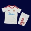 Seville Home Kids Kits 25/26 front with mini crest and child fit.