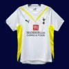 front view of Tottenham home white retro jersey (09/10) with modern trims.