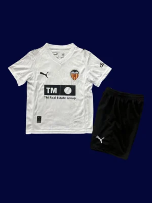Valence Home Kids Kits 25/26 front with mini crest and child-friendly fit.