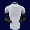 Uruguay home player jersey 26/27 back with number area.