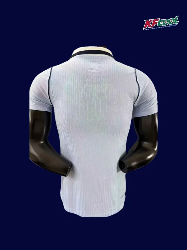 Uruguay home player jersey 26/27 back with number area.